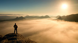 man looking at the skies and heavens